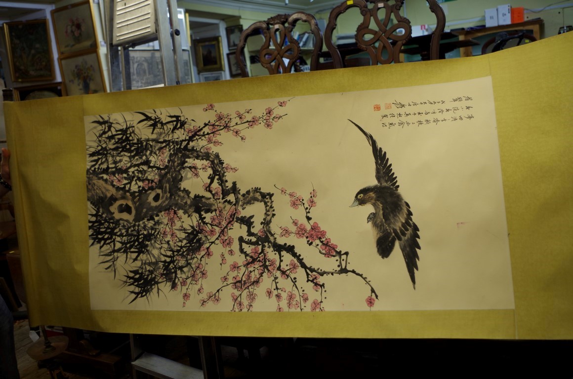 Chinese School, a bird with flowering prunus, watercolour scroll, 134 x 67cm.