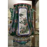 An unusual Chinese famille verte twin handled vase, of quatrefoil form, 23cm high.