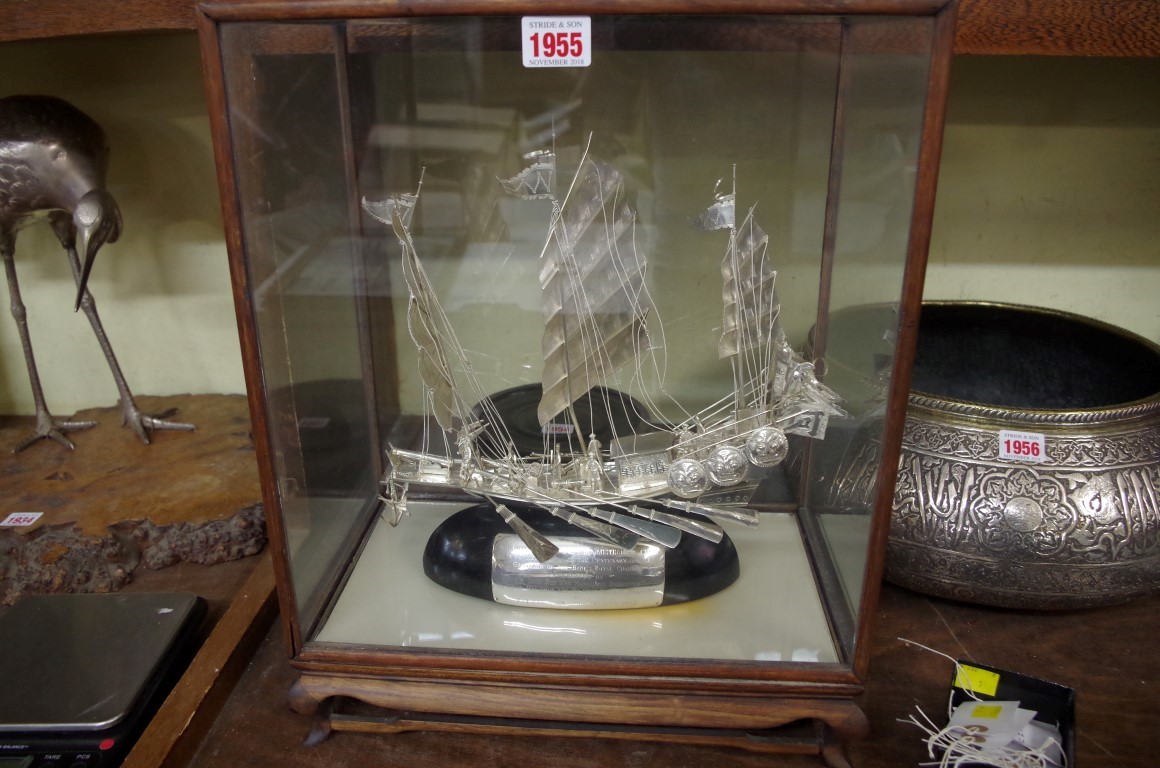 A Chinese silver junk, by Tackhing, with presentation inscription, the hull 25cm long, in a glass