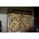 A Burmese giltwood panel, 19th century, relief decorated with a figure and scrolling foliage, 29 x