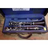 A Boosey & Hawkes clarinet, no.36465, in fitted case.