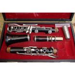 A Boosey and Hawkes Regent clarinet, no.426240, boxed.