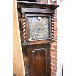 A 1920s oak musical longcase clock, striking on gongs, 188.5cm high, with pendulum.