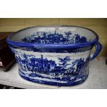 A twin handled blue and white footbath, 45.5cm wide.