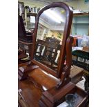 A large Victorian mahogany toilet mirror, 64cm wide.