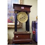 A 19th century Continental mahogany and ebonized portico style clock, 47.5cm high.