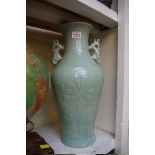 A Chinese celadon twin handled vase, 42.5cm high.