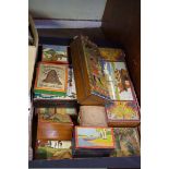 A collection of antique Continental painted and stained wood boxes.