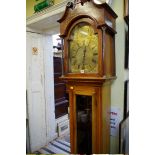 An 18th century style mahogany and inlaid 8 day longcase clock, with a 12in brass arched dial,