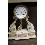 A late 19th century alabaster mantel clock, 36cm high.