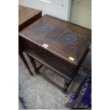 A carved oak bible box on stand, 48cm wide.