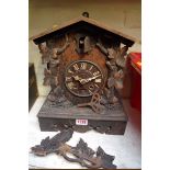 A Black Forest cuckoo clock, 30.5cm high.