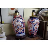 Two similar Japanese Imari table lamps, (a.f.).