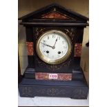 A slate and marble mantel clock, 34cm high; together with a black glazed pottery samovar.