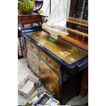 A Chinese style black and gilt side cabinet, 123cm wide.