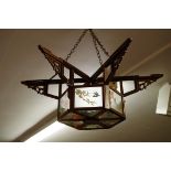 A Chinese hardwood and painted glass hexagonal ceiling light, 57cm diameter; together with another