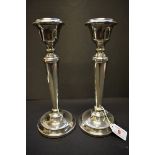 A pair of silver candlesticks, by S J Rose & Son, Birmingham 1972, 24cm.