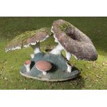 Garden Statuary: A rare painted composition stone group of toadstools French, mid 20th century