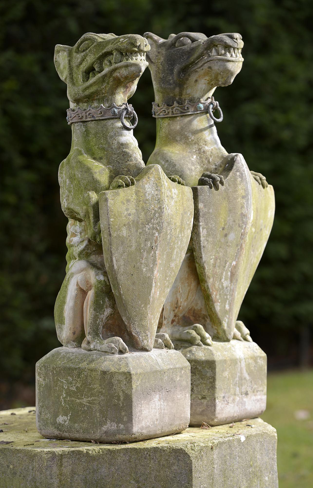 Architectural: A pair of composition stone armorial gate pier beasts with lead collarsmodern80cm