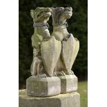 Architectural: A pair of composition stone armorial gate pier beasts with lead collarsmodern80cm