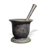 A Carron Foundry iron pestle and mortarmid 19th centurythe pestle stamped Carron the pestle 23cm