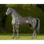 Equestrian/Garden Sculpture: A life size bronze figure of a mare, 214cm high by 240cm long