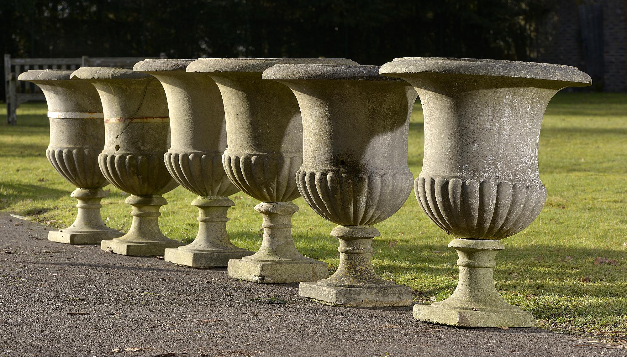 Planters: A similar pair of carved marble urns19th century73cm high