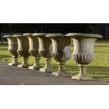 Planters: A similar pair of carved marble urns19th century73cm high