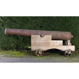 Toys for Boys: A Georgian cast iron cannon early 19th centuryon later softwood carriage with iron