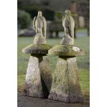 Garden Statuary: A pair of carved staddlestones with later composition stone eagles112cm high
