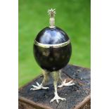 Modern Sculpture: An Ostrich egg trinket box with silvered eagle claw feet and pineapple28cm high by