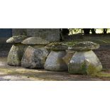 Garden Statuary: A set of four squat Cotswold stone staddlestonesthe largest 64cm high