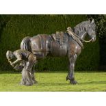 Equestrian/Garden Sculpture: A life size bronze group of a farrier shoeing a dray horse