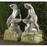 Water Feature/Garden Statuary: A pair of composition stone figural bird baths, 2nd half 20th