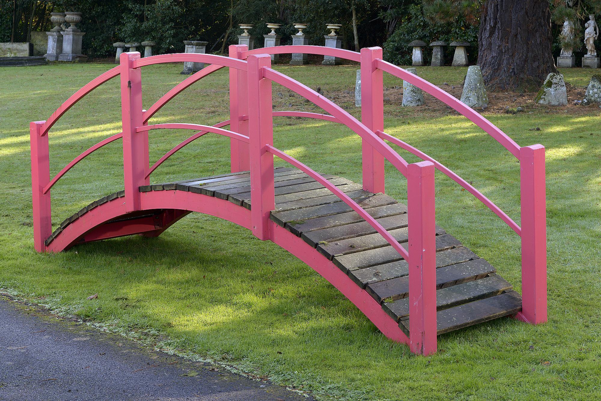 Garden Structure: A cast iron bridge with wooden slats145cm high by 400cm long by 96cm wide