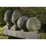 Architectural: A pair of composition stone pineapple gate pier finials 2nd half 20th century52cm