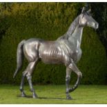 Equestrian/Garden Sculpture: A life size bronze figure of a stallion, 240cm high by 210cm long