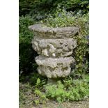 Planters: A near pair of Victorian carved stone urnscirca 186061cm high
