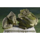 Architectural: An unusual ciment fondu medieval style grotesque gargoyle making obscene gesture