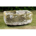 Planter/Water Feature: A carved D-shaped limestone trough with divider43cm high by 100cm long by