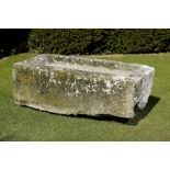 Planter/Water Feature: A carved limestone rectangular trough 56cm high by 175cm long by 82cm deep