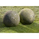 Architectural: A pair of carved stone gate pier balls19th century36cm diameter