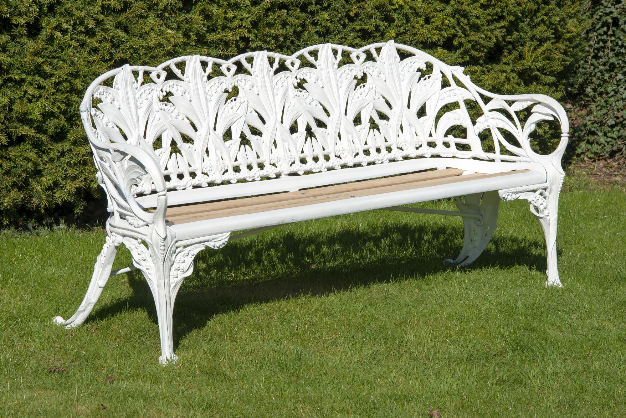 Garden seat: A Coalbrookdale Lily of the Valley pattern cast iron seat , late 19th century fully