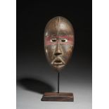 Tribal/Ethonographic: A female face mask “Deangle”, Dan people, Ivory Coast, 1920’s 25.5cm, This ‘