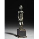 Tribal/Ethonographic: A female bronze figurine, Dogon people, Mali, 1930’s An uncoated bronze