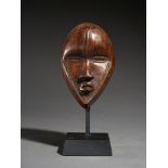 Tribal/Ethonographic: A miniature mask “Ma Go”, Dan people, Ivory Coast, 1930’s 17cm, ’Deangle’ mask