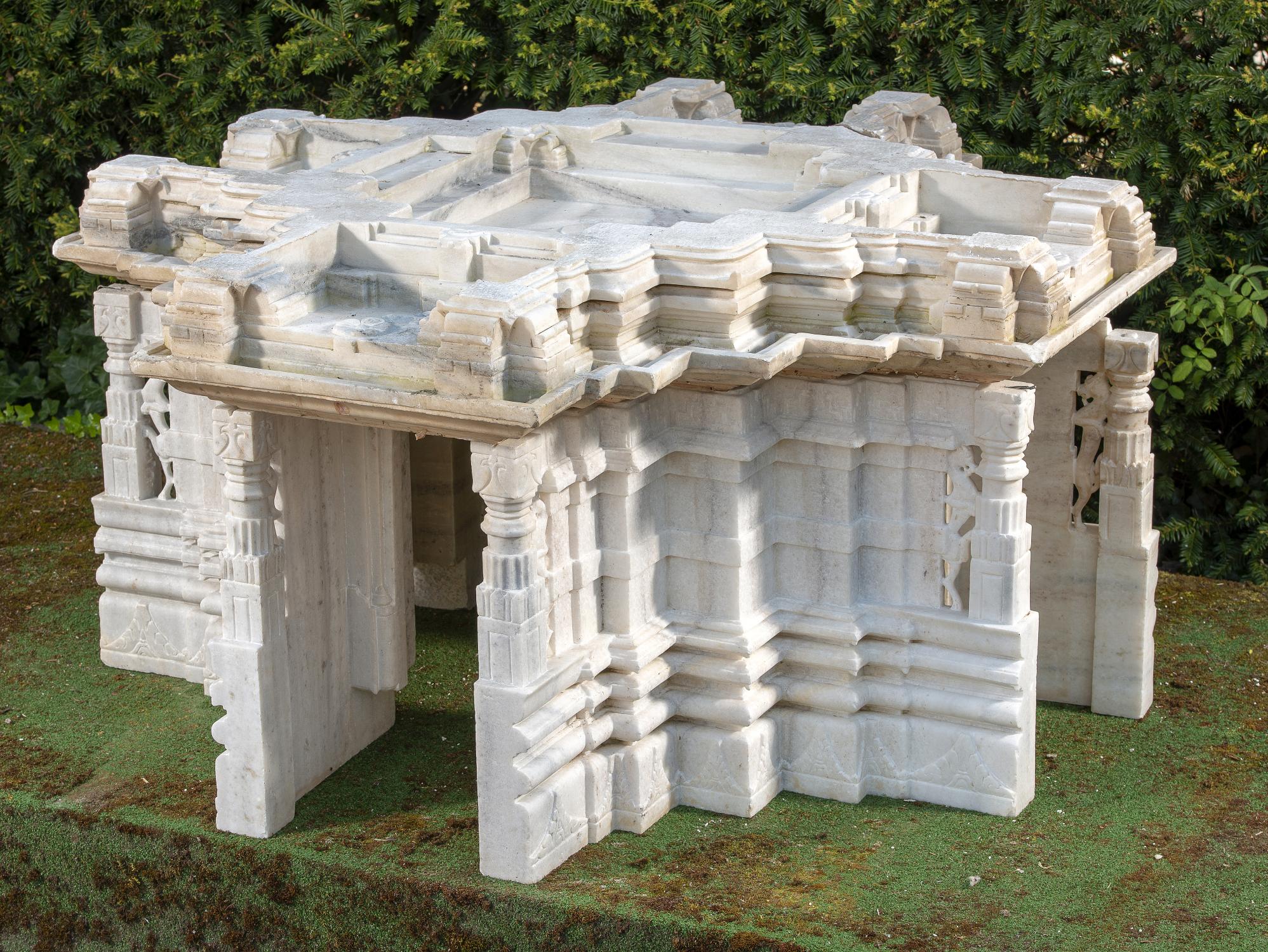 A carved white marble Jain Libation Altar, Indian, 19th century or earlier 122cm square