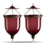 Lighting: A near pair of metal mounted and glass lanterns, early20th century 50cm high