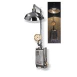 Lighting: An iron and brass wall light, made up from a 1950s Bill Royal 3 phase fuse box and