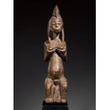 Tribal/Ethnographic: Wooden seated figure called Gwandusu, Bambara People, Mali, 2nd quarter of 20th